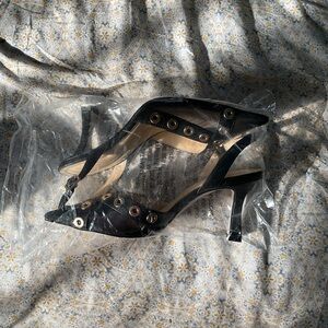 Elegant Black Women's Shoes with Gold Accents